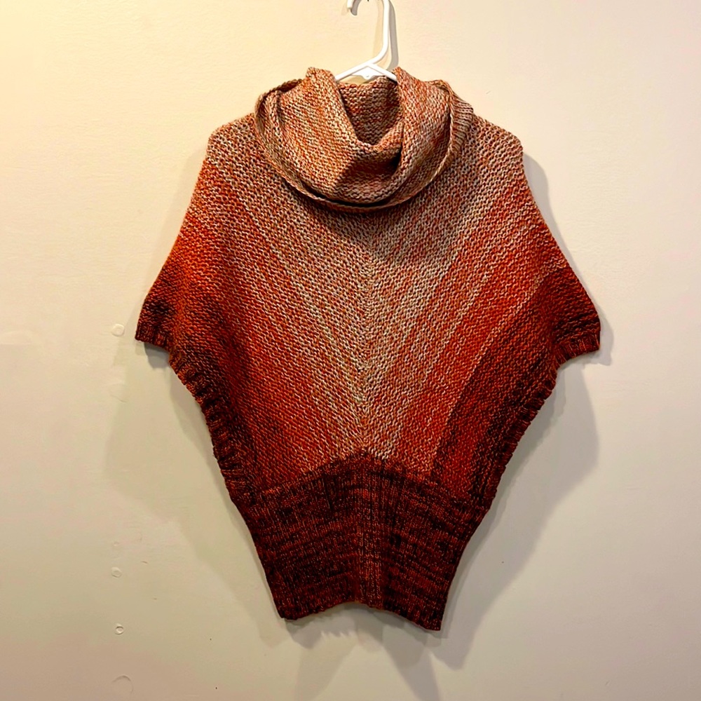Hand knit pull over sweater. Brand new. Size medium- X-large.